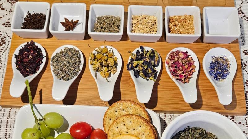 Custom tea blending ingredients in tasting dishes